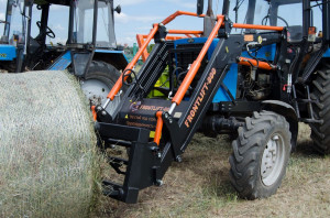 Погрузчик фронтальный FRONTLIFT-1200, с модернизированными гидравлическими магистралями, к тракторам БЕЛАРУС